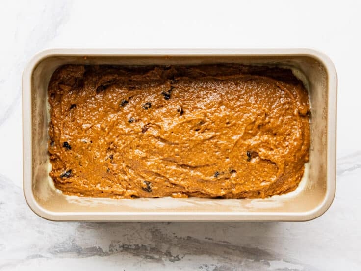 Boston brown bread recipe batter in a loaf pan before baking.