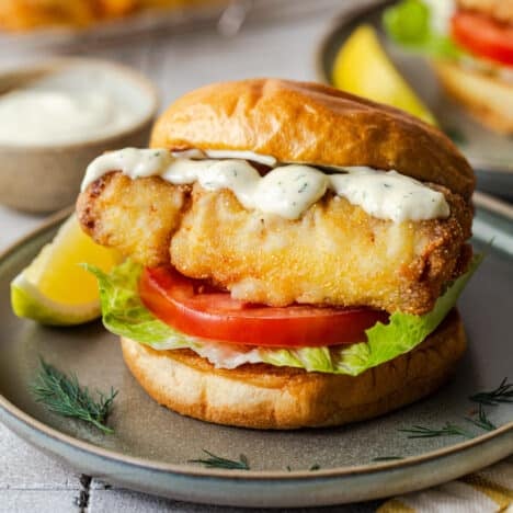 Square image of a crispy fried fish sandwich recipe.