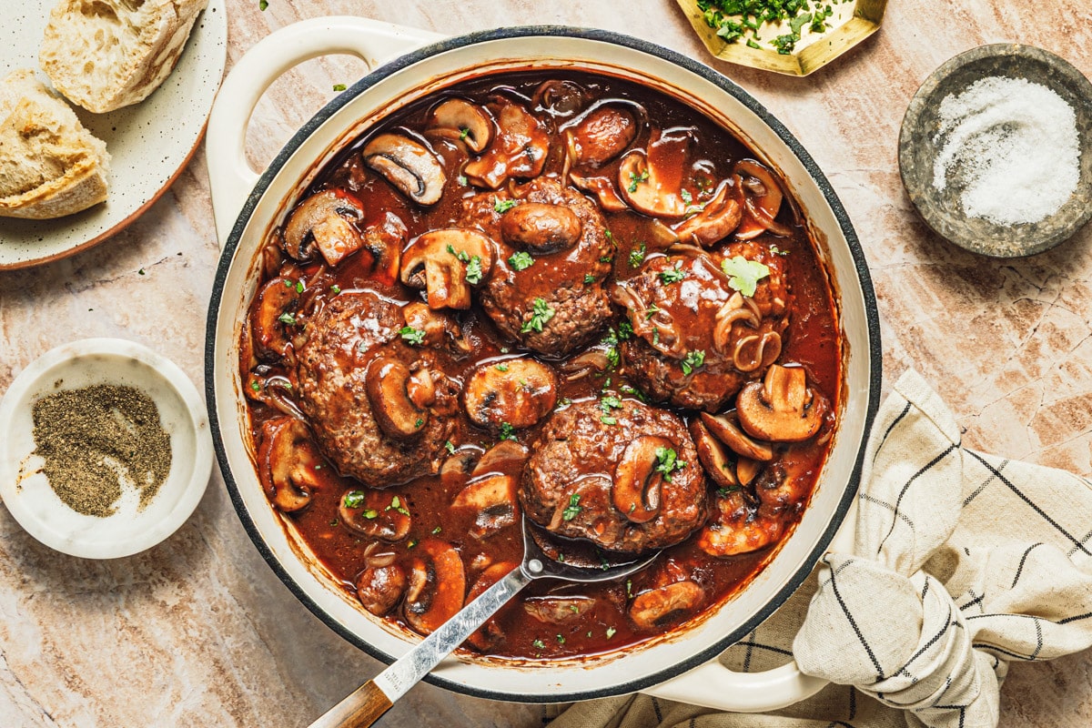 Horizontal overhead shot of a homemade Salisbury steak recipe with mushroom gravy.