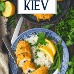 Overhead shot of Chicken Kiev recipe with text title overlay