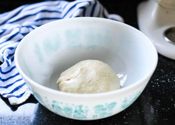 Cinnamon roll dough in a bowl