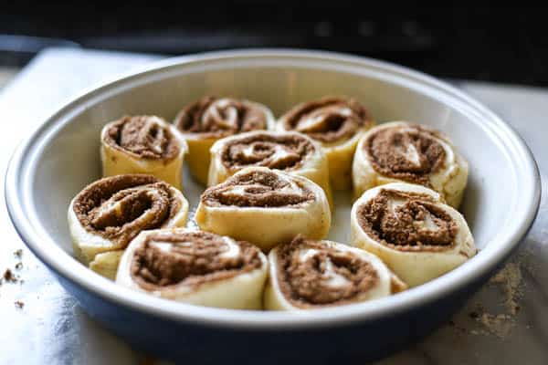 Easy cinnamon rolls in a pan before baking