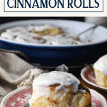 Front shot of a cinnamon roll on a plate with text title box at top