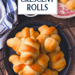 Overhead shot of homemade crescent rolls with text title box at the top