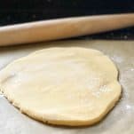 Rolling out homemade sugar cookie dough