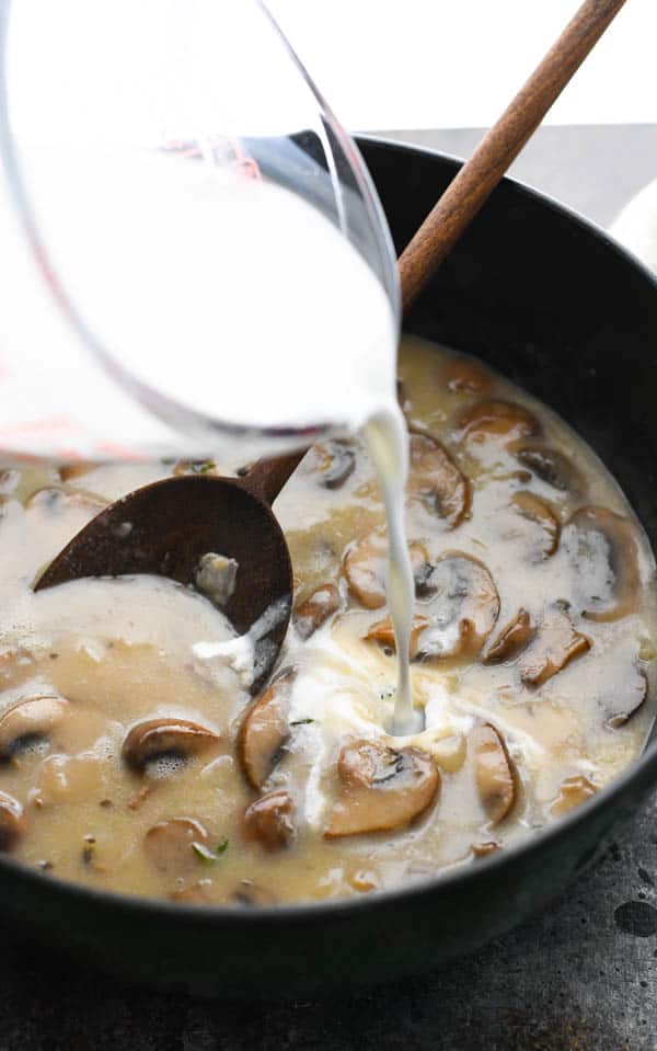 Process shot showing how to make a simple mushroom soup recipe