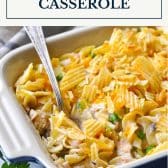 Dish of tuna noodle casserole with text title box at top