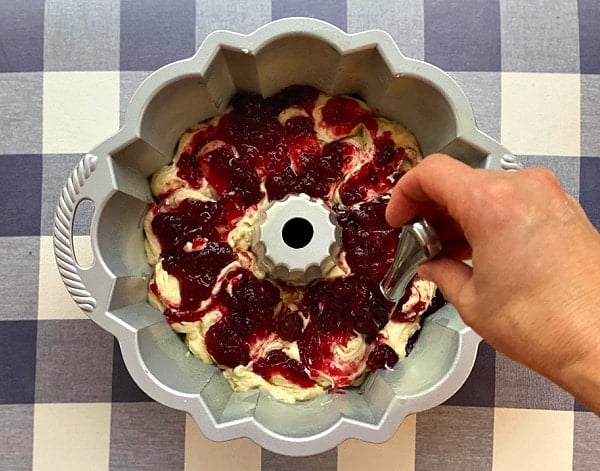Swirling cranberry sauce into cake batter