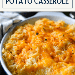 Close up front shot of potato casserole recipe in a dish with text title box at top