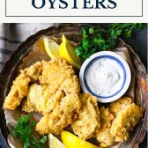 Pan of fried oysters with text title box at top.