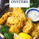 Basket of fried oysters with text title overlay.