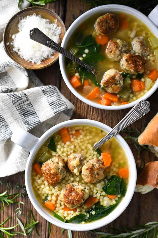 Overhead shot of two bowls of authentic Italian Wedding Soup
