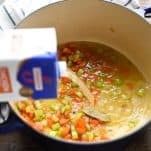 Process shot showing how to make Italian Wedding Soup