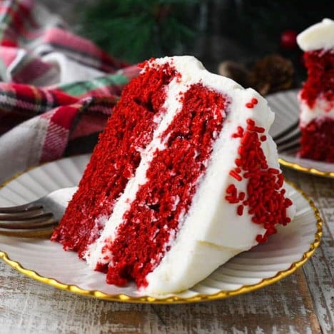 Square side shot of a slice of red velvet cake on a plate