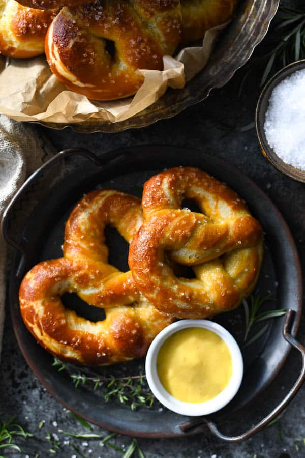 Overhead image of soft pretzels on a round platter
