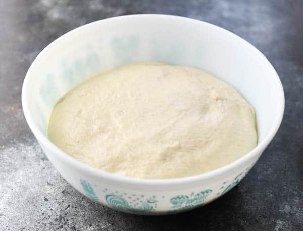 Soft pretzel dough in a large mixing bowl