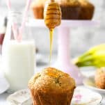 Drizzling honey on the best banana muffins