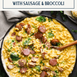 Text title box over an image of smoked sausage pasta skillet