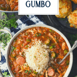 Overhead shot of a bowl of chicken and sausage gumbo with text title overlay