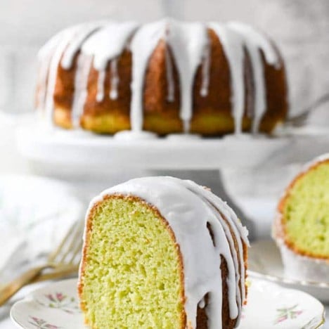 Front shot of a slice of pistachio bundt cake on a small plate