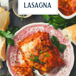 Overhead image of a plate of easy homemade lasagna with text title box at top
