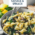 Side shot of a bowl of Penne pasta with sausage and spinach with text title overlay