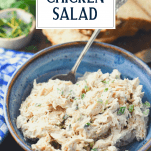 Close up shot of the best chicken salad recipe in a blue bowl with text title overlay