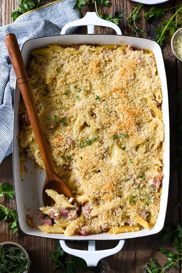 Overhead image of a white baking dish full of easy chicken cordon bleu casserole made with leftover ham and chicken