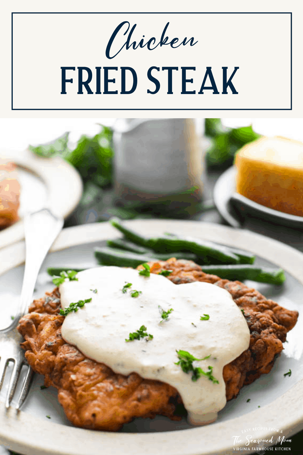 Plate of chicken fried steak with gravy and a text title box at top