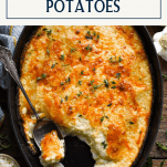 Overhead shot of a dish of easy au gratin potatoes with text title box at top