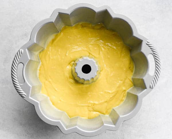 Process shot showing how to make Duncan Hines Lemon Bundt Cake using cake mix