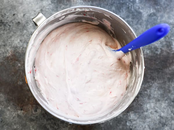 Bowl of strawberry cream cheese frosting