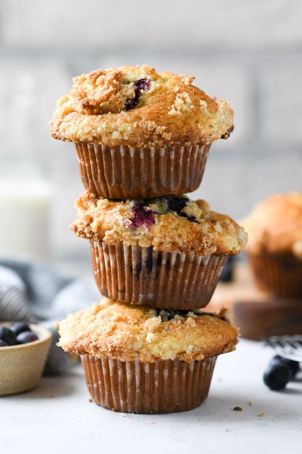 Stack of three blueberry streusel muffins