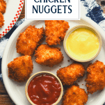 Overhead shot of a plate of fried chicken nuggets with text title overlay