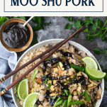 Overhead image of a bowl of authentic moo shu pork with rice and a text title box at top
