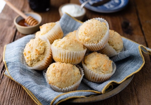 Horizontal shot of a bowl full of sour cream muffins
