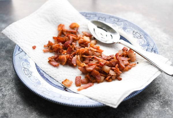 Crispy chopped bacon on a plate