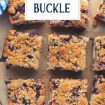 Overhead shot of bars of moist blueberry buckle with text title overlay