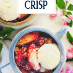 Close overhead shot of a bowl of plum crisp with text title overlay