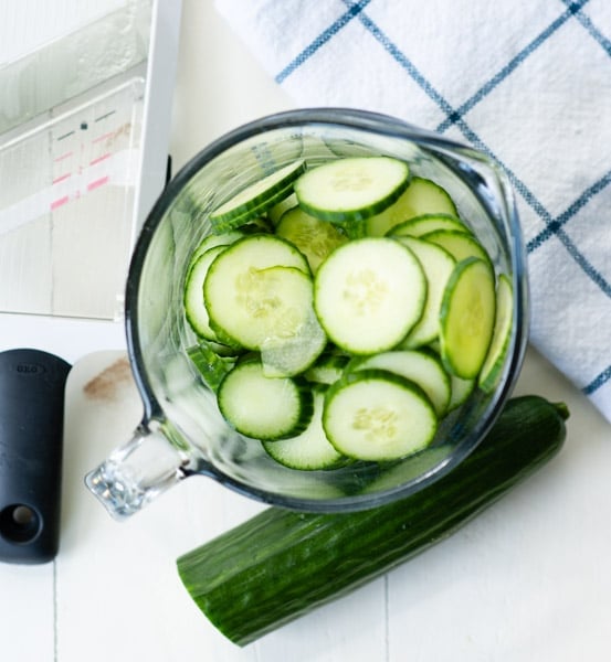 Sliced cucumber in a glass bowl