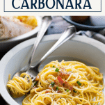 Side shot of a carbonara recipe with text title box at top