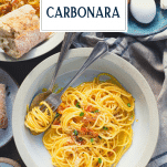 Overhead image of a bowl of the best spaghetti carbonara recipe with text title overlay
