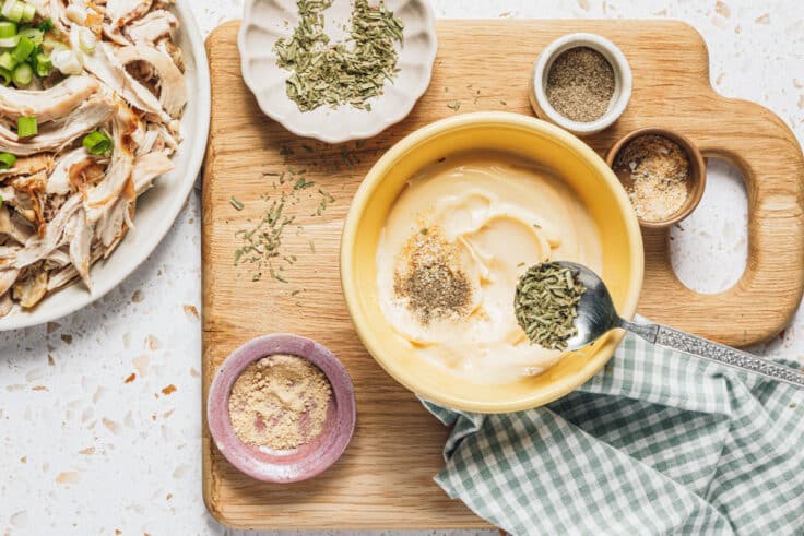 Stirring together the creamy mayo dressing for the best chicken salad recipe.