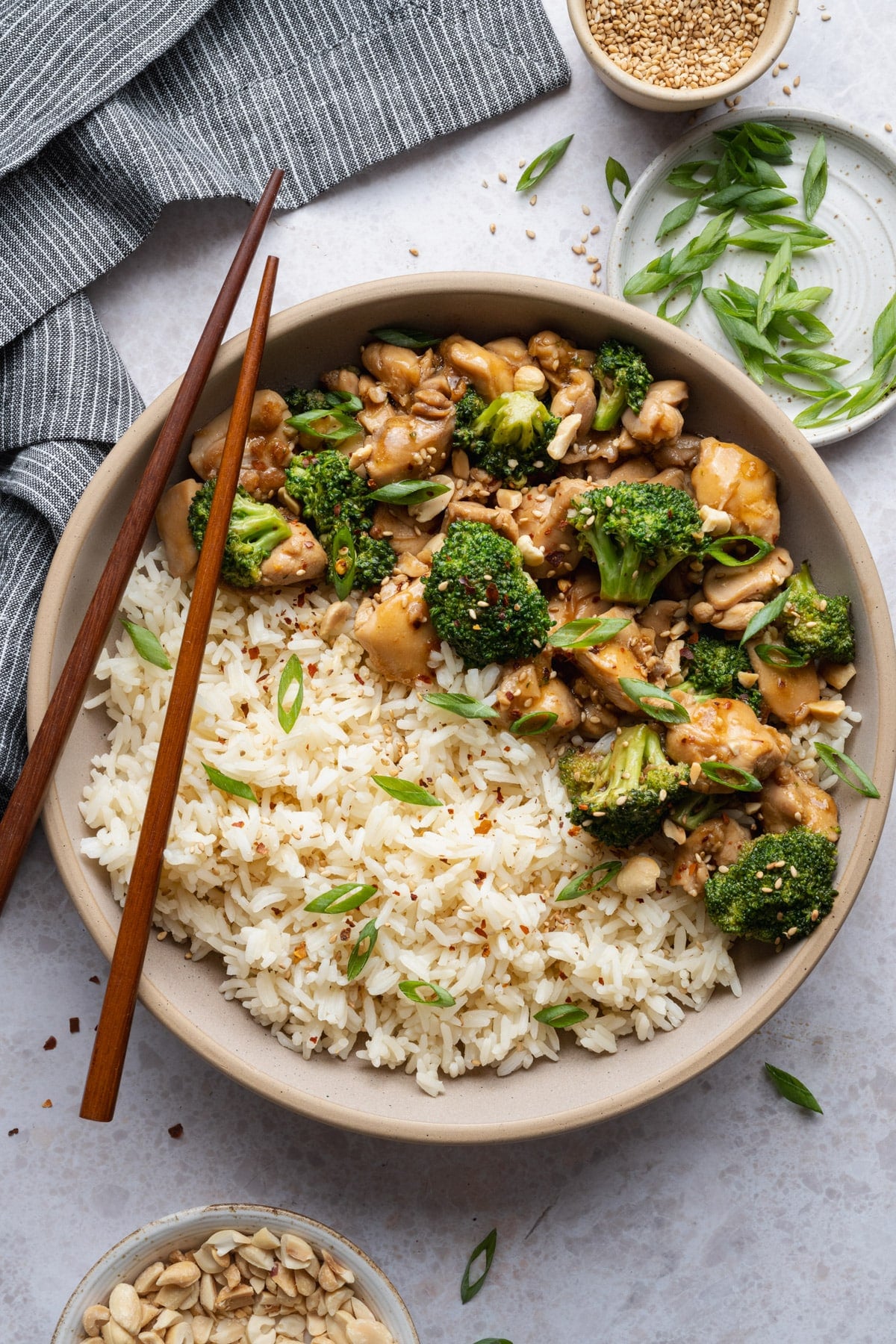 Overhead shot of a bowl of chicken and broccoli stir fry with rice.