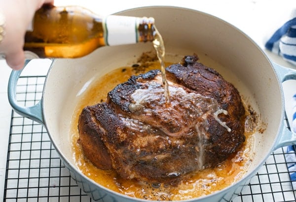 Pour beer on a beef roast
