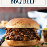 Close up of beef bbq sandwich with text title box at top