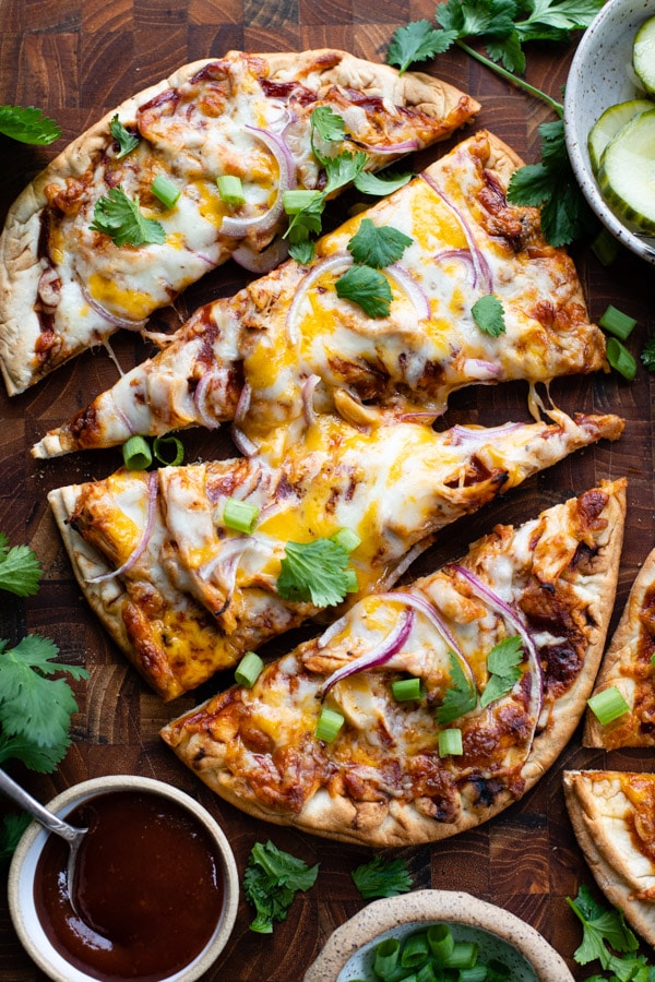 Close up image of the best bbq chicken pizza recipe on a cutting board