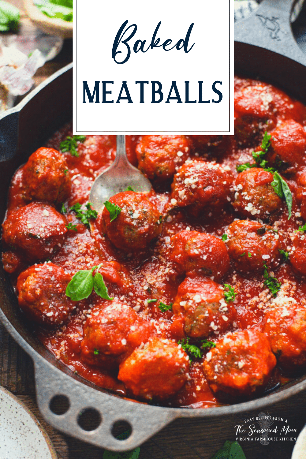 Close up shot of a spoon serving baked meatballs with text title overlay