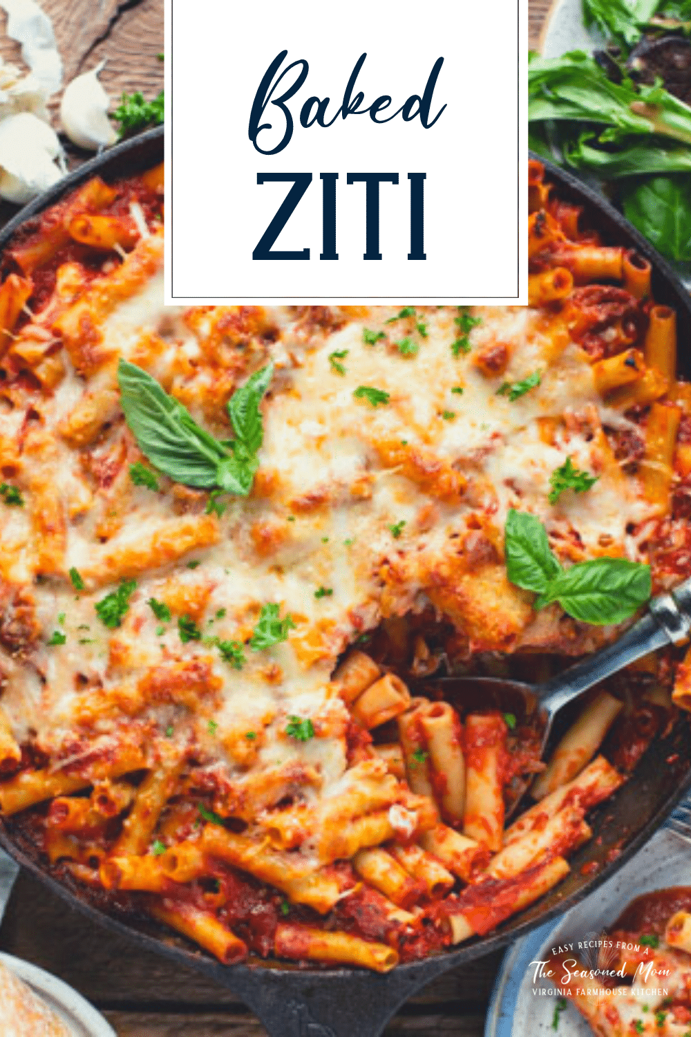 Pan of baked ziti with sausage with text title overlay