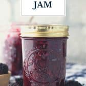 Jar of blackberry jam with text title overlay.
